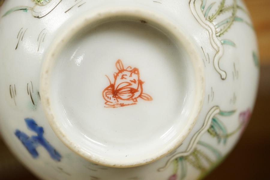 An early 20th century Chinese famille rose teapot, later famille rose teabowl, sang de boeuf stem bowl and two others, tallest 11cm. Condition - varies